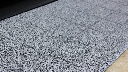 Slip-Resistant Ceramic-Coated Quartz Traction Surface