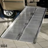 SCG-6 6 L x 29 W Silver Spring Aluminum Single-Fold Anti-Skid Wheelchair Ramp - 600 lb Cap 1